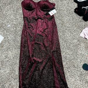 Long burgundy, slit dress.